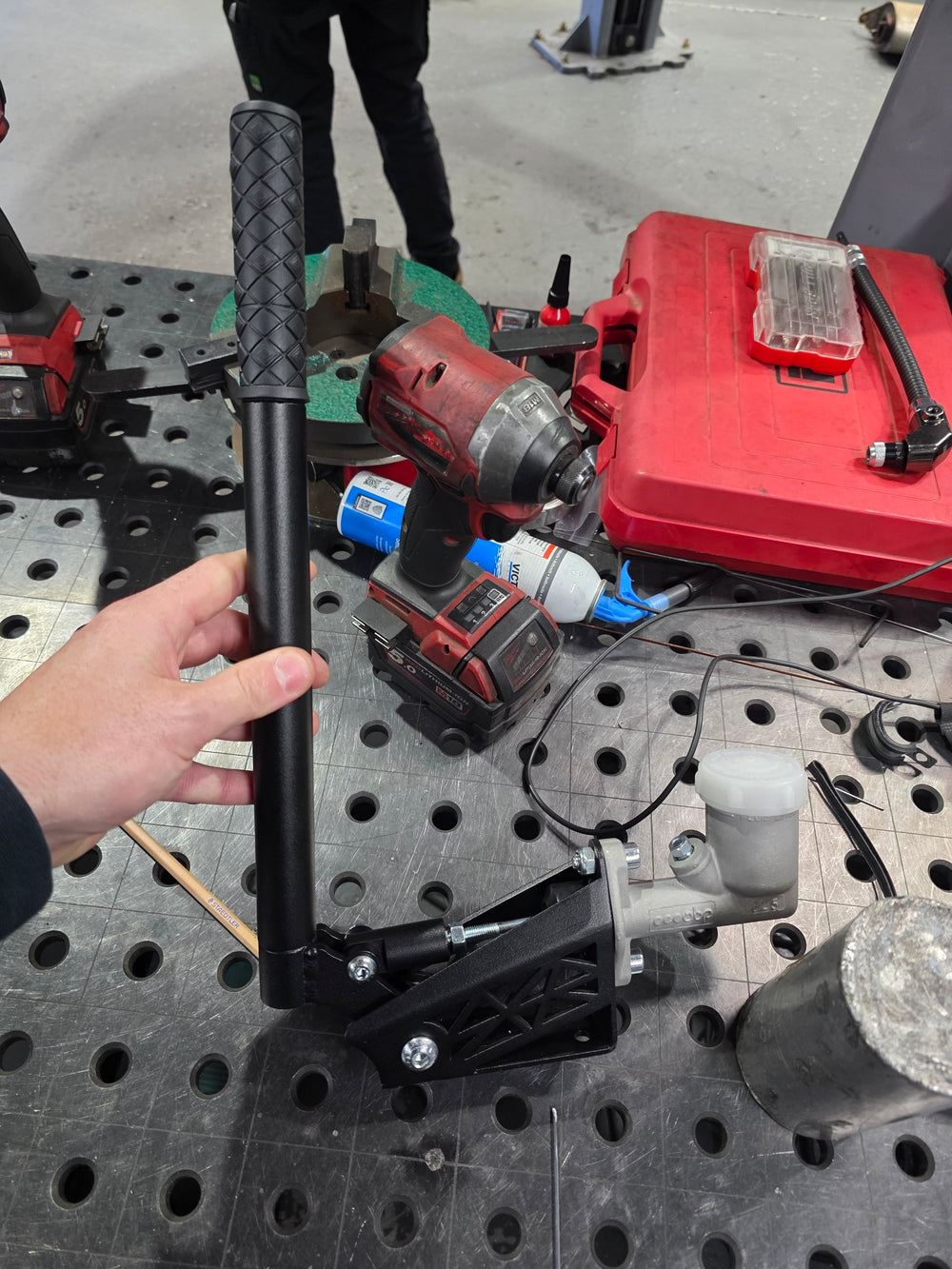 CHP hydro handbrake assembly with black grip lever, fabricated mount, and hydraulic master cylinder